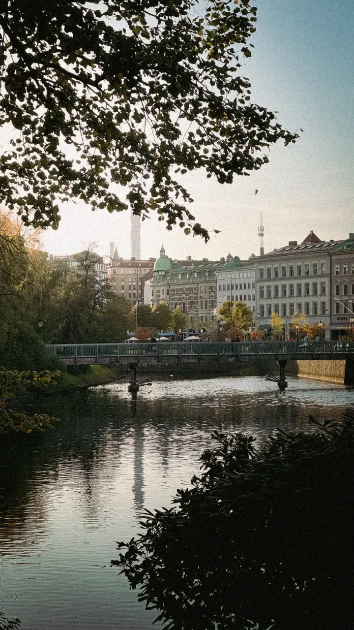Buildings and a bridge reflected in a Gothenburg canal