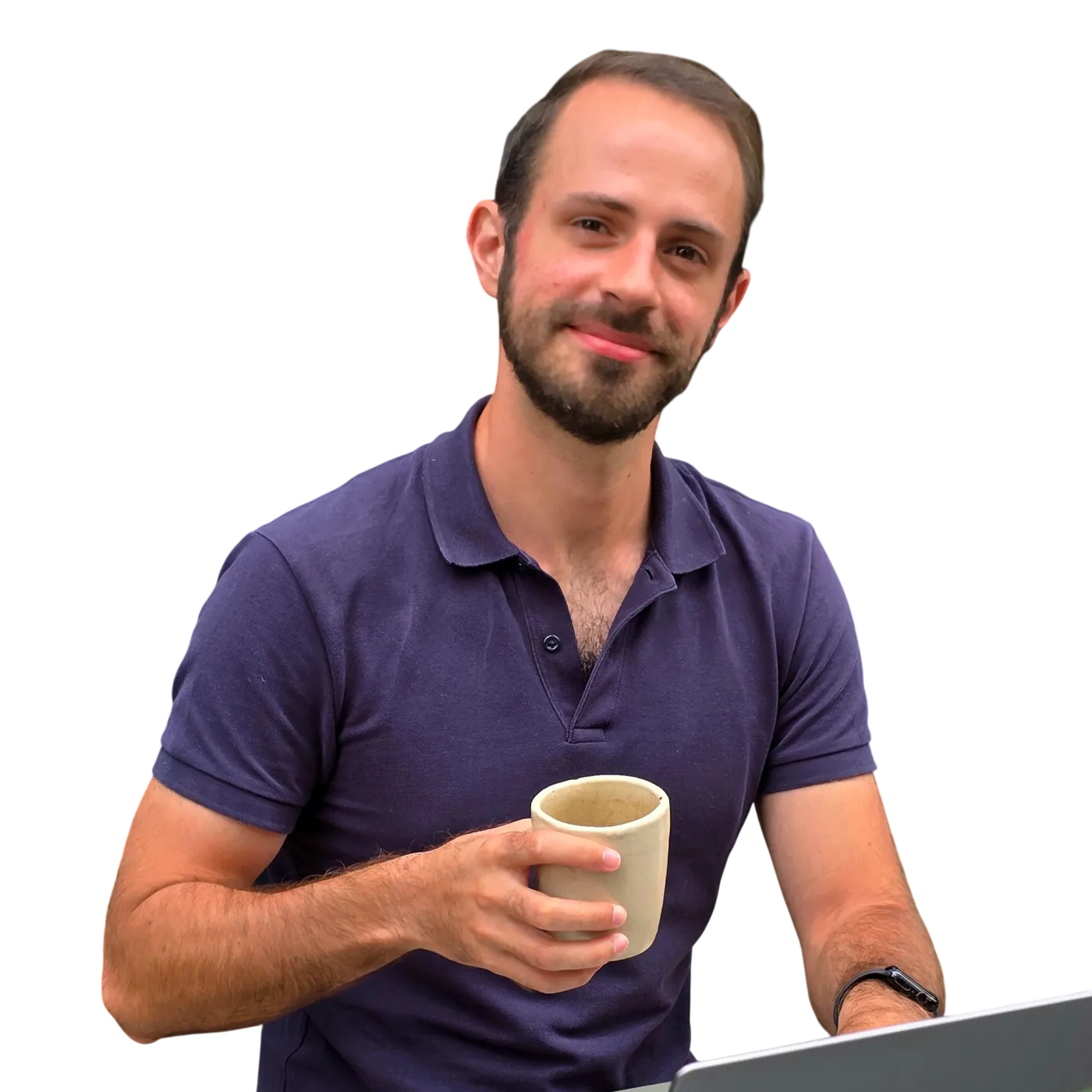 Théo Penavaire in a navy polo, holding a ceramic cup